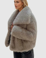 Dames pluizige imitatiebontjas 2