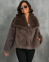 Dames pluizige imitatiebontjas 5