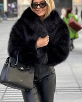 Dames pluizige imitatiebontjas 6