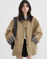 Damesjas met contrasterende afwerking en knoopjes 0